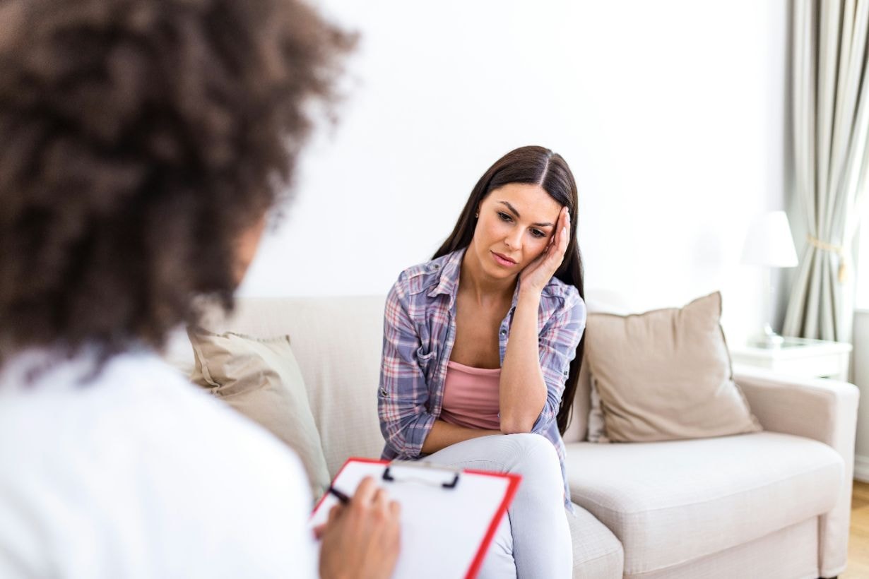 Depressed lady in a counselling session